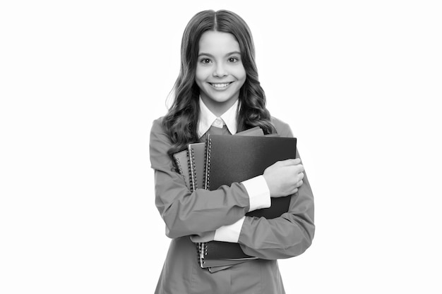 Colegial feliz con cuaderno chica adolescente con cuaderno regreso a la escuela niño listo para estudiar