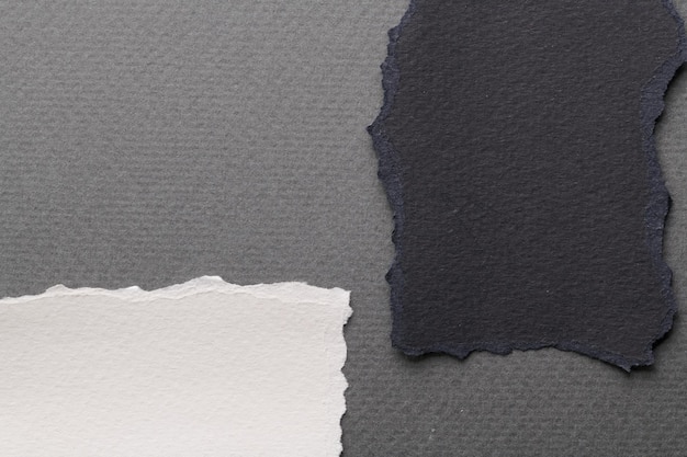 Collage artístico de trozos de papel rasgado con bordes rasgados Colección de notas adhesivas colores blanco gris negro fragmentos de páginas de cuaderno Fondo abstracto