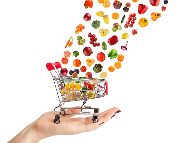 Collage de carrito de compras con verduras y frutas aisladas