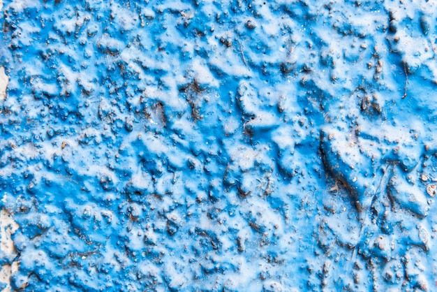 Color azul del fondo de la pared de cemento áspero.