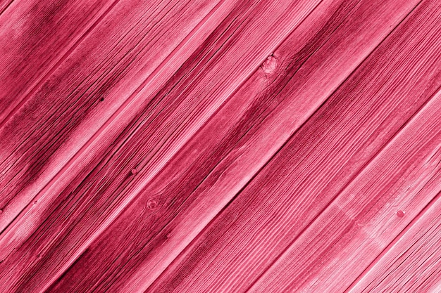 Foto color de moda del año 2023 panel de madera como fondo o textura tonificada en color magend