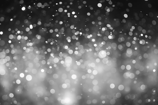 Los colores de luz bokeh negro y blanco en un fondo abstracto