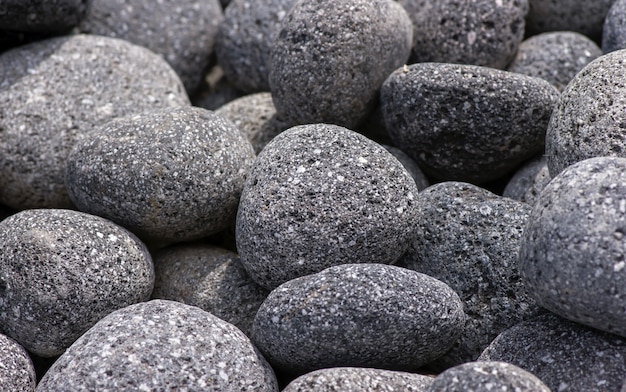 Los colores naturales de las rocas volcánicas del monte Merapi en Yogyakarta, Indonesia, para el fondo.