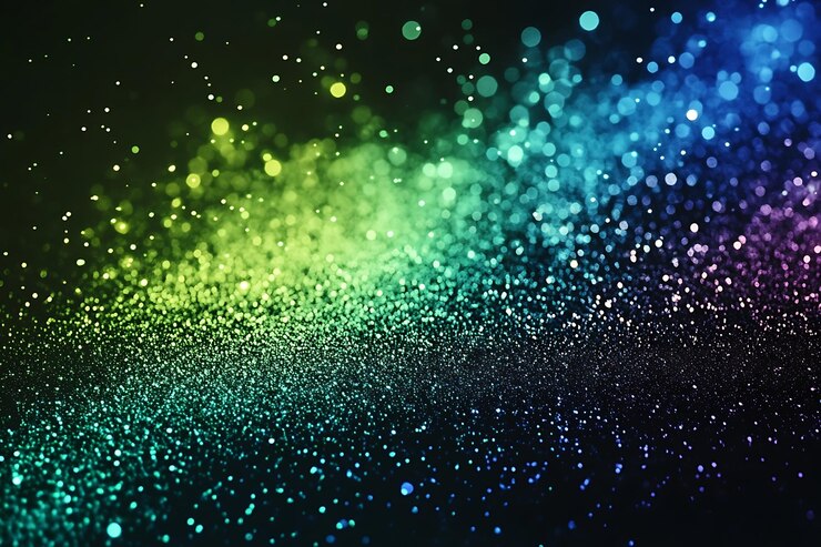 Las coloridas partículas de polvo brillantes