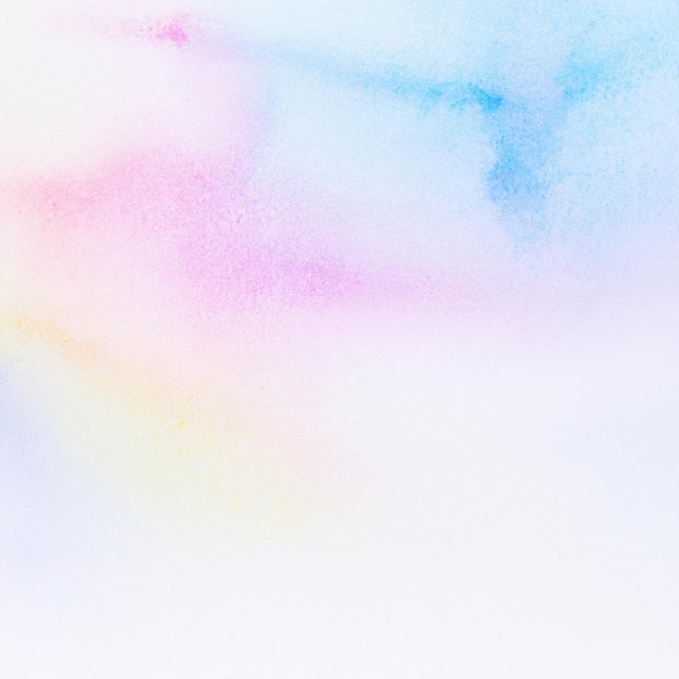 Un colorido fondo de acuarela con un degradado rosa y azul.