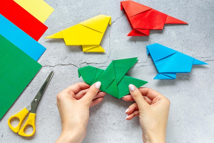 Foto colorido origami papel loros creatividad infantil