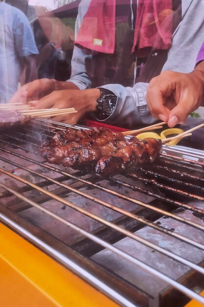 Foto comida de rua satay