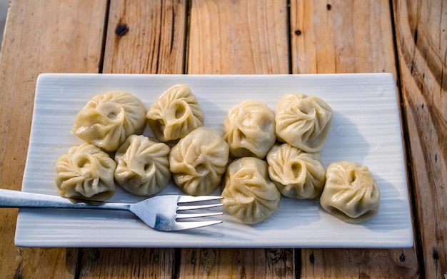 Comida tradicional china hecha a mano al vapor Dumplings Momos