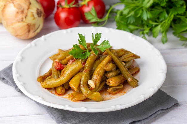 Foto comida tradicional turca deliciosa feijão verde com azeite nome turco zeytinyagli taze fasulye