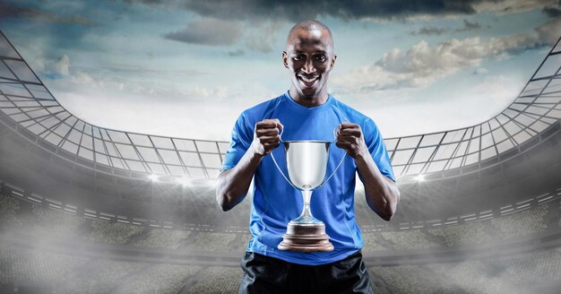 Composição do esportista comemorando a vitória, segurando o troféu no estádio