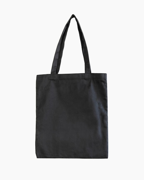 Foto comprador de bolsa de compras negra en maqueta de fondo blanco para plantilla de bolsa de algodón negro de marca