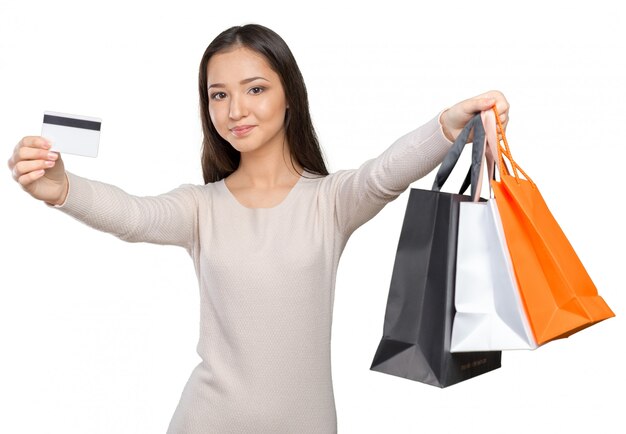 Compras mujer sosteniendo bolsas de compras