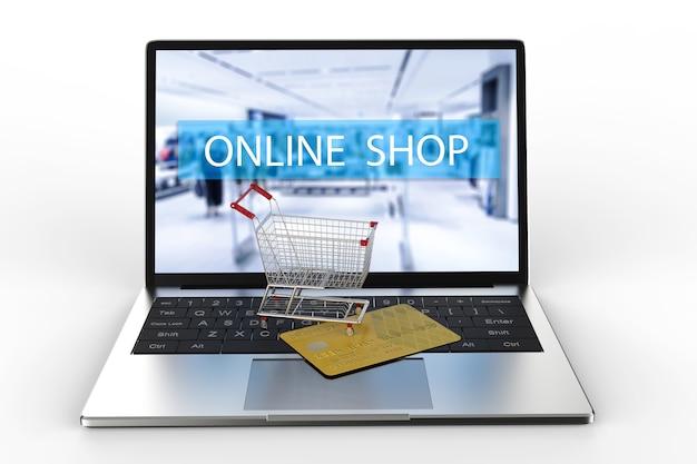 Foto compras online com notebook e carrinho de compras