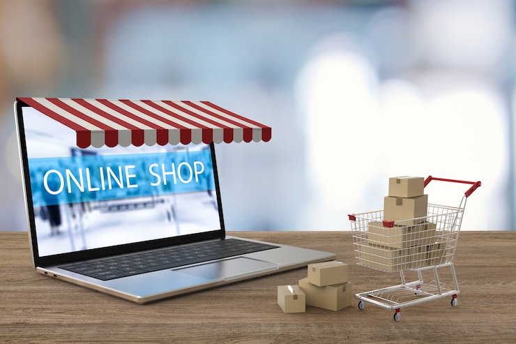 Foto compras online com notebook e carrinho de compras