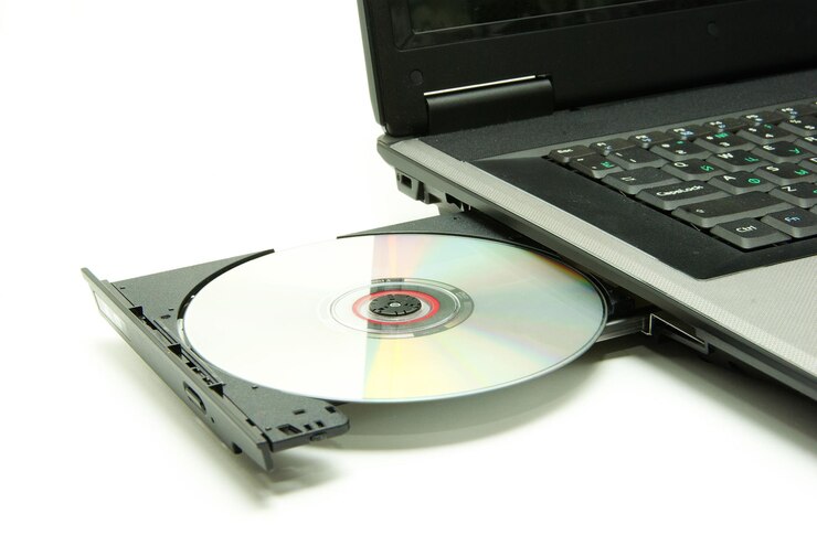 Foto computador portátil com cd