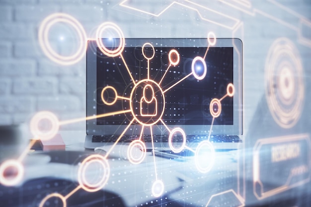 Computadora en el escritorio con holograma de red social Múltiple exposición Concepto de conexiones internacionales de personas