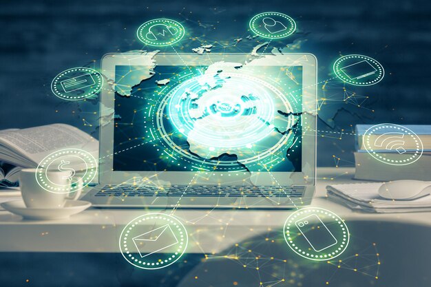 Computadora en el escritorio con icono del tema de la red social Exposición múltiple Concepto de conexiones internacionales