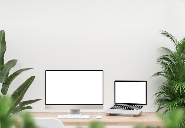 Computadora y laptop con pantalla en blanco