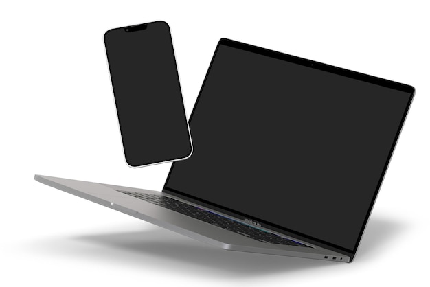 Una computadora portátil está abierta y un teléfono encima.