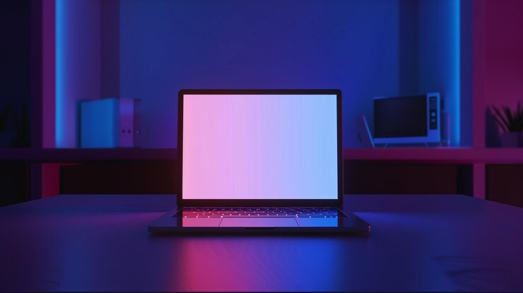 Foto computadora portátil de neón con pantalla en blanco