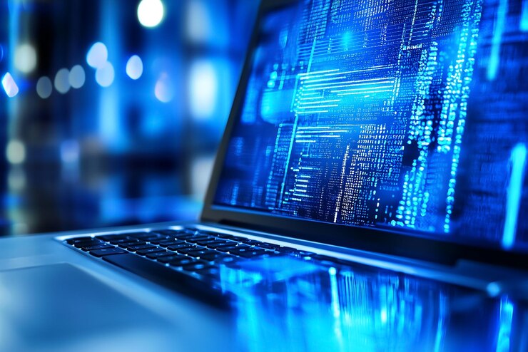 una computadora portátil con una pantalla azul que dice x en la parte inferior
