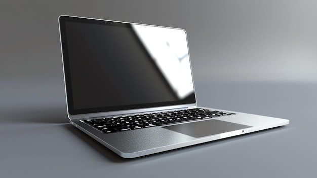 Una computadora portátil plateada con una pantalla negra está en ángulo sobre un fondo gris