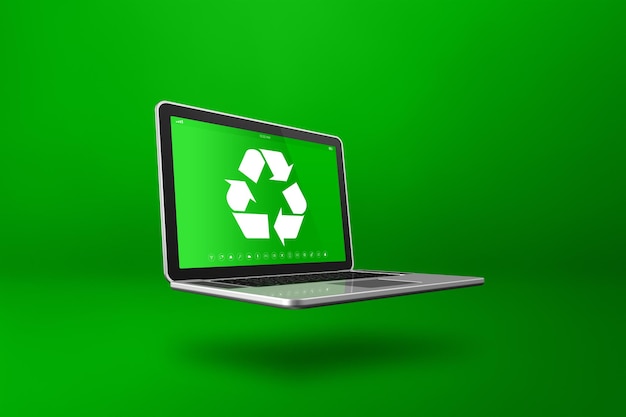 Computadora portátil con un símbolo de reciclaje en la pantalla concepto de conservación ambiental