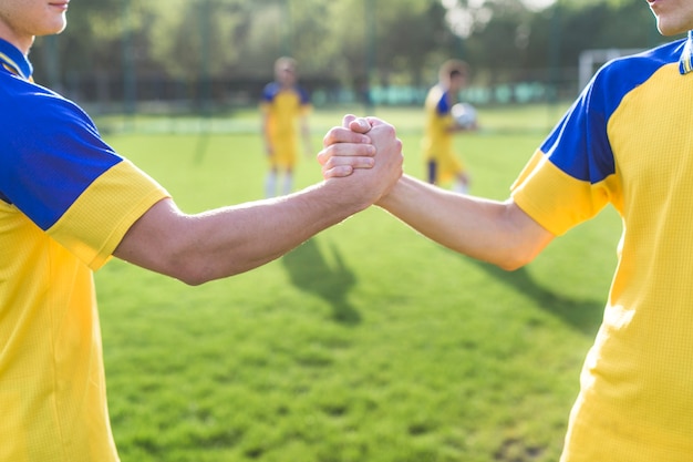 Conceito amador de futebol e trabalho em equipe