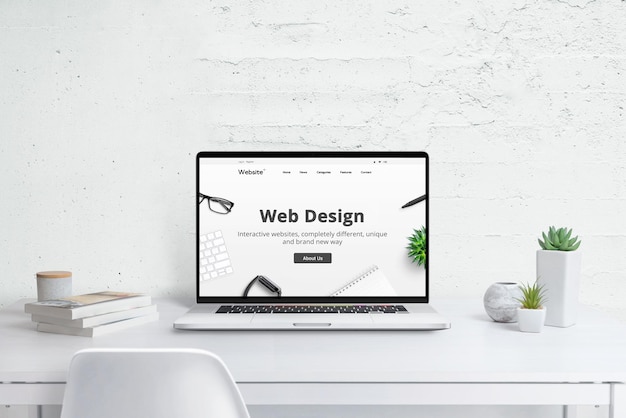 Foto conceito criativo de estúdio de web design computador portátil moderno com tema de design plano de site da empresa