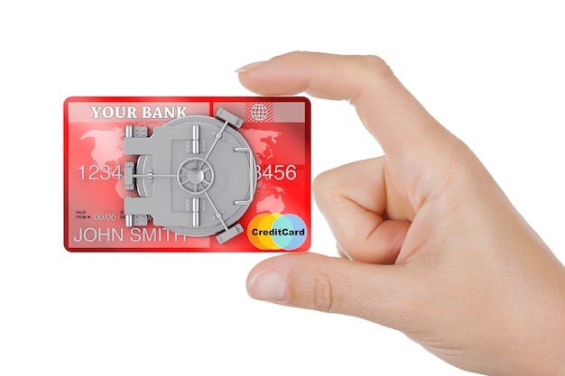 Conceito de banco on-line seguro. Closeup mulher mão segurar o cartão de crédito com porta do cofre do banco em um fundo branco.
