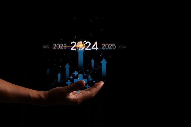 Conceito de contagem regressiva para 2024 que toca em uma barra de download virtual com um medidor de progresso de carregamento na véspera de Ano Novo, transformando o ano de 2023 em 2024