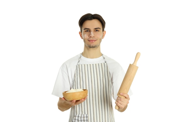 Conceito de cozinhar jovem de avental isolado no fundo branco