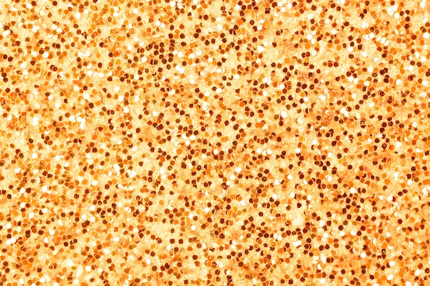 Conceito de efeitos de brilho laranja brilhante, fundo de textura brilhante, foto de superfície detalhada com lixa