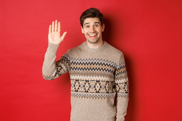 Conceito de festa de natal e feriados com um jovem bonito