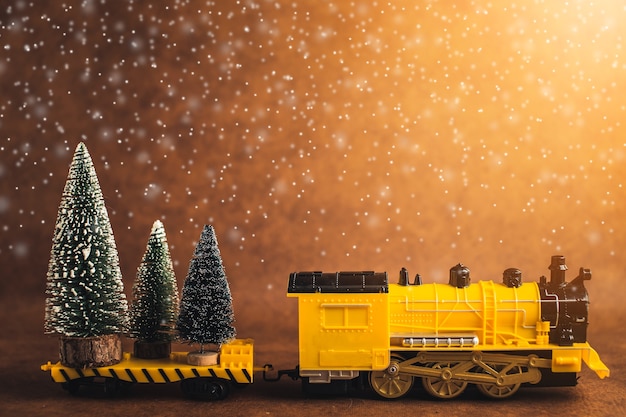 Conceito de idéias da noite de natal com trem amarelo