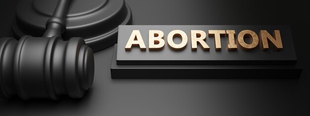 Foto conceito de lei de aborto terminação de gravidez legal ou ilegal texto e martelo de juiz 3d render