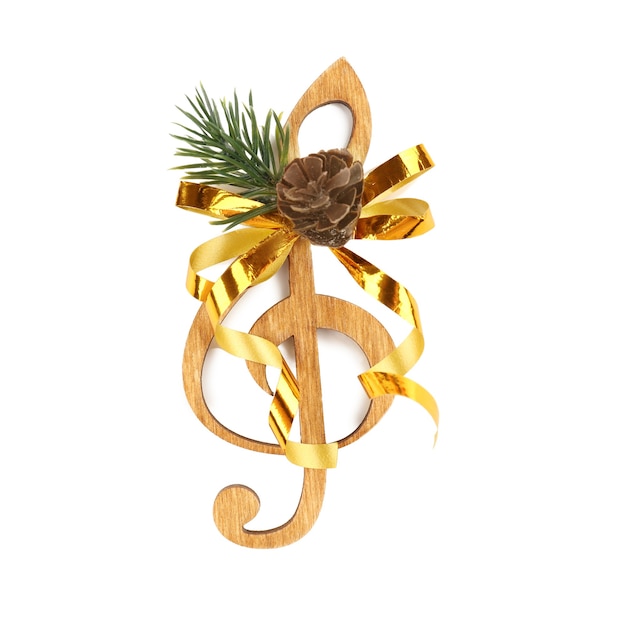 Conceito de música de Natal. Clave decorativa com arco, isolada no branco