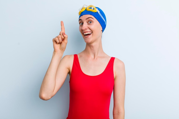 Foto conceito de nadador de mulher bonita adulta jovem