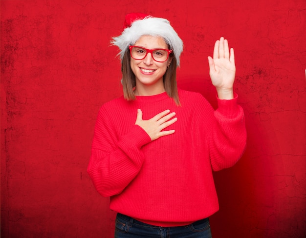 Foto conceito de natal jovem mulher bonita. fundo editável