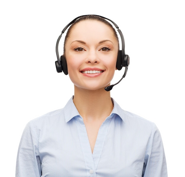 conceito de negócios e escritório - operador de linha de apoio feminino amigável com fones de ouvido