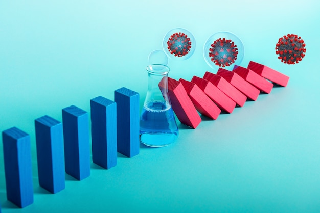 Conceito de pandemia de coronavírus covid19 com corrente em queda como um jogo de dominó. O contágio e a progressão da infecção foram interrompidos pela cura da pesquisa médica. Parede ciana