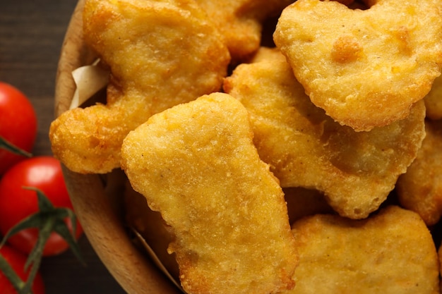 Conceito de saborosos nuggets de comida rápida ou lixo