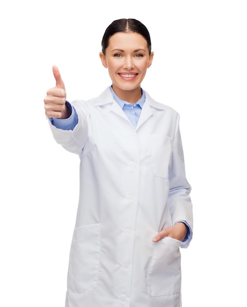 conceito de saúde e medicina - médica sorridente mostrando os polegares para cima