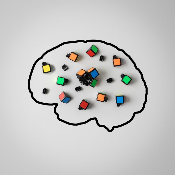 Conceito de saúde mental. Silhueta de um cérebro humano com um quebra-cabeça quebrado em um fundo cinza.