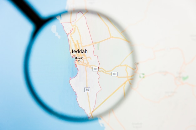 Conceito ilustrativo de visualização da cidade de Jiddah, Arábia Saudita na tela de exibição através de lupa