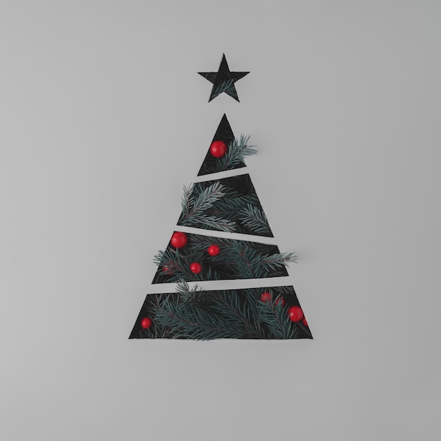 Concept creativo de Navidad Árbol de Navidad con bolas rojas sobre fondo gris