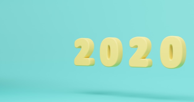 Concepto de año nuevo Pastel amarillo 2020 Feliz año nuevo flotando en azul pastel