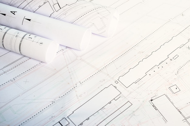 Foto el concepto de arquitectura. planos de planos de construcción dibujos