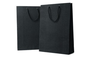 Foto concepto de black friday venta bolsas negras aislado sobre fondo blanco.