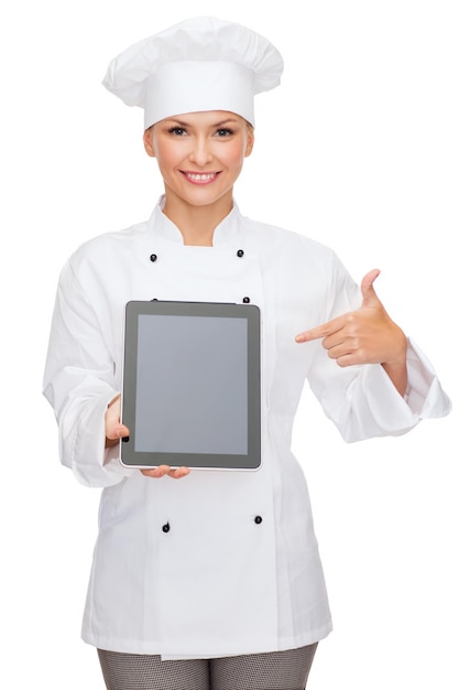 concepto de cocina, tecnología y comida - chef, cocinera o panadera sonriente con pantalla en blanco de computadora de tablet pc